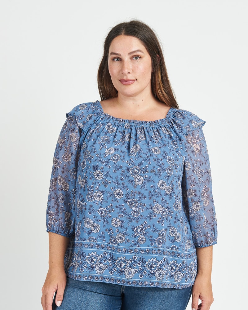 Front of a model wearing a size 3X Aila Smocked Top with Ruffles in M409 Blue by Daniel Rainn. | dia_product_style_image_id:271899